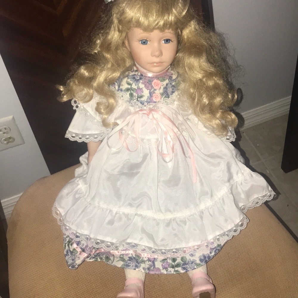 20” Blonde porcelain doll in pink floral  dress |